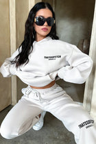 Jogging femme beige coupe large en molleton