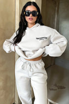 Jogging femme beige coupe large en molleton